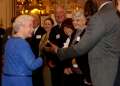 469973015-queen-elizabeth-ii-meets-guests-including-gettyimages.jpg