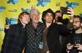 466364558-actors-rupert-grint-ron-perlman-robert-gettyimages.jpg