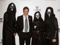 187482011-hugh-grant-poses-with-death-eaters-at-the-gettyimages.jpg