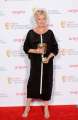 492011911-julie-walters-with-her-felowship-award-at-gettyimages.jpg