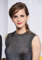 476250985-actress-emma-watson-poses-in-the-press-room-gettyimages.jpg